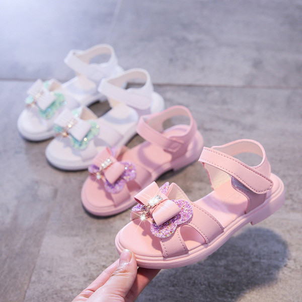 Mūsdienīgas bērnu sandales ar lentīti un akmentiņiem
