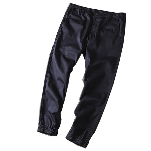 Moodsad meeste püksid pahkluu ja taskutega