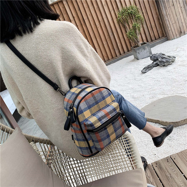 Naiste moodne ruuduline lukuga seljakott