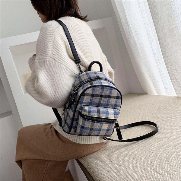 Naiste moodne ruuduline lukuga seljakott