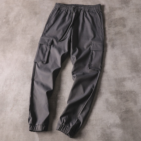 Hit pantaloni la modă pentru bărbați cu talie elastică și buzunare