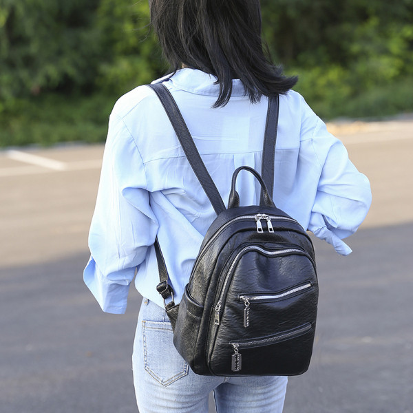Naiste ajakohane lihtsa mudeli tõmblukuga seljakott