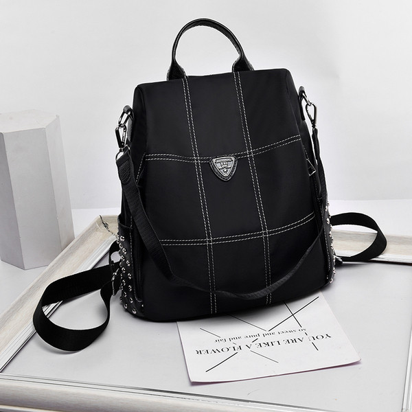 Rucsac modern pentru femei cu ochiuri