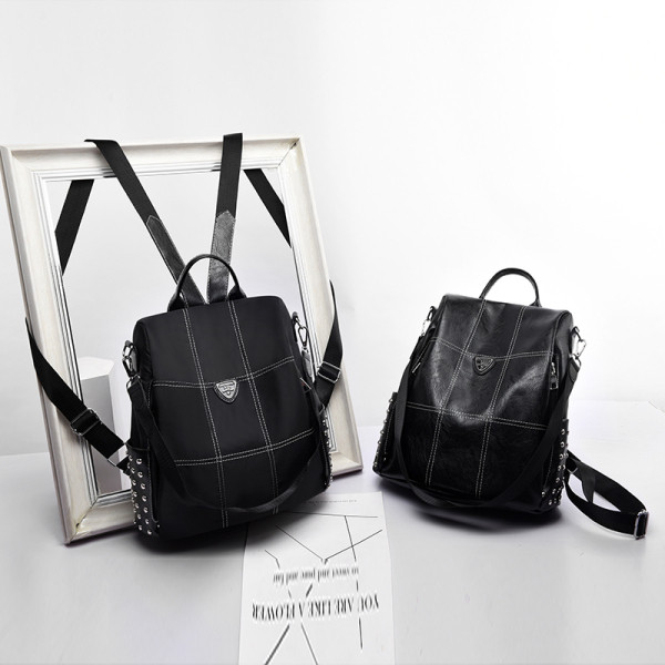 Rucsac modern pentru femei cu ochiuri