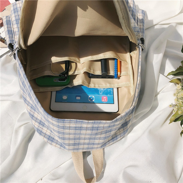 Igapäevane naiste ruuduline lukuga seljakott