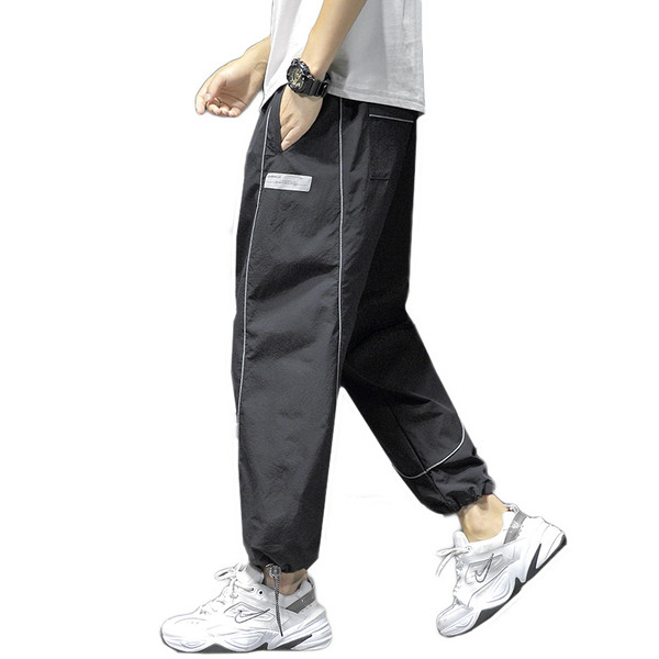 Sportlik-vabaaja meeste pükste lai mudel, pahkluudel kummiga