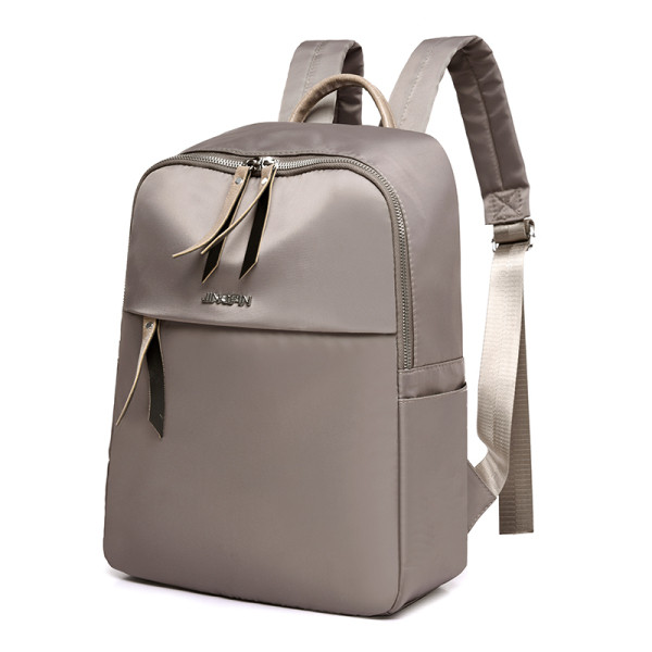 Stiilne naiste seljakoti tavaline mudel kirjaga