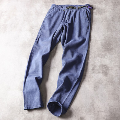 Ležerne muške hlače s kožnim elementom u struku