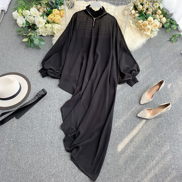 Pikk asümmeetriline naiste särk luku ja vööga