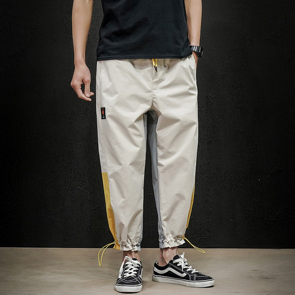 Model nou de pantaloni barbatesti cu aplicatie pe picior