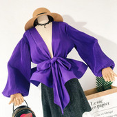 Jauna modeļa aktuāls sieviešu krekls ar dziļu kakla izgriezumu un vidukļa saitēm