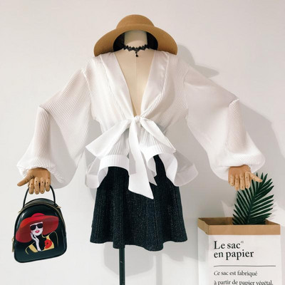 Jauna modeļa aktuāls sieviešu krekls ar dziļu kakla izgriezumu un vidukļa saitēm