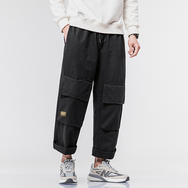 Vīriešu platas bikses ar lielām kabatām