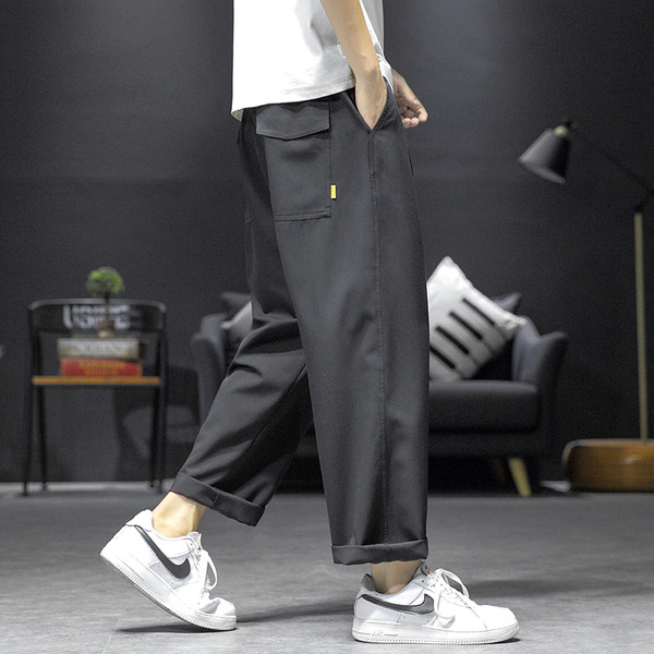 Sporta-gadījuma vīriešu bikses plats modelis