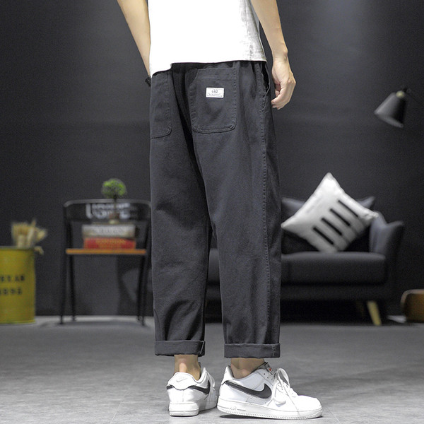 Férfi széles zsebes nadrág