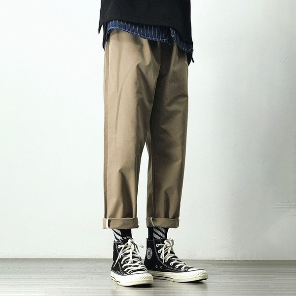 Vīriešu bikses ar krāsainu izšuvumu un izmēriem līdz 5XL