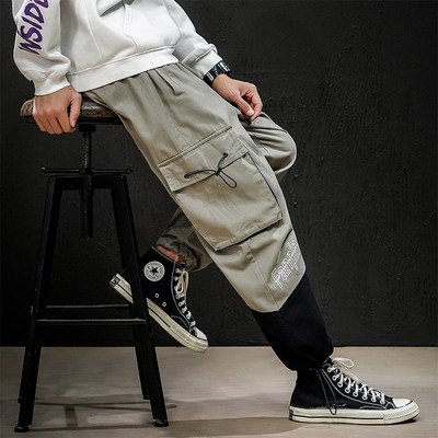 Vīriešu ikdienas bikses ar lielām kabatām un izmēriem līdz 5XL