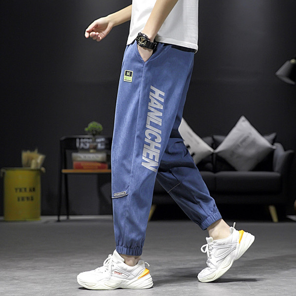 Vīriešu sporta bikses ar uzrakstu