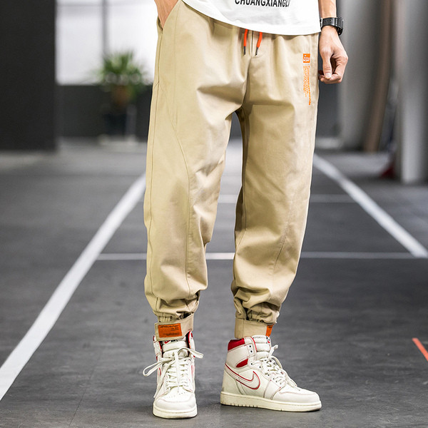 Vīriešu bikses ar velcro potīšu ielāpiem