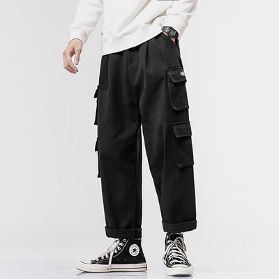 Vīriešu bikses ar kabatām plats modelis