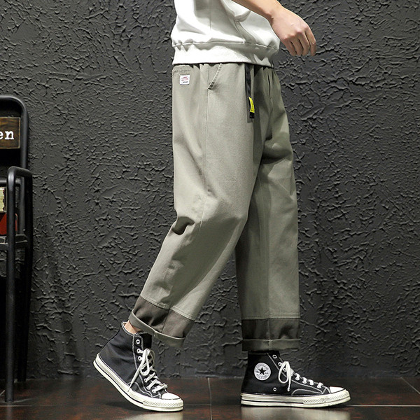 Vīriešu ikdienas bikšu plats modelis