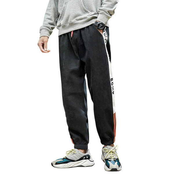 Vīriešu sporta bikses ar uzrakstu un apmalīti