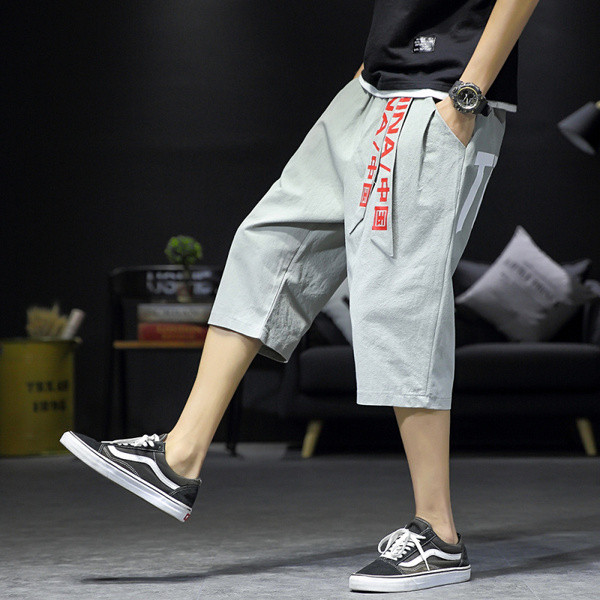 Jauna modeļa vīriešu šorti ar uzrakstu