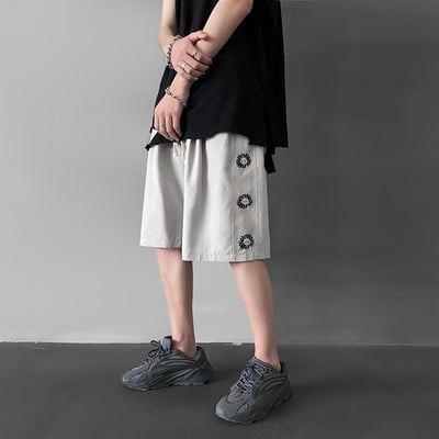 Sporta un ikdienas vīriešu šorti ar izšuvumu - ziedu