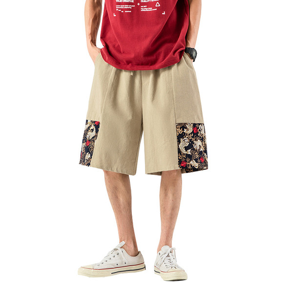 Suvised lühikesed värvimustriga spordipüksid