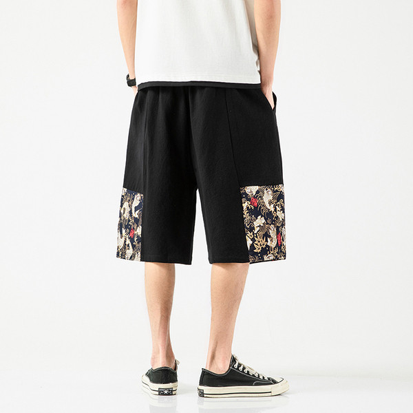 Suvised lühikesed värvimustriga spordipüksid