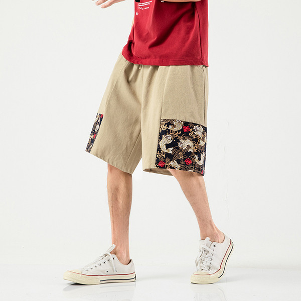 Suvised lühikesed värvimustriga spordipüksid