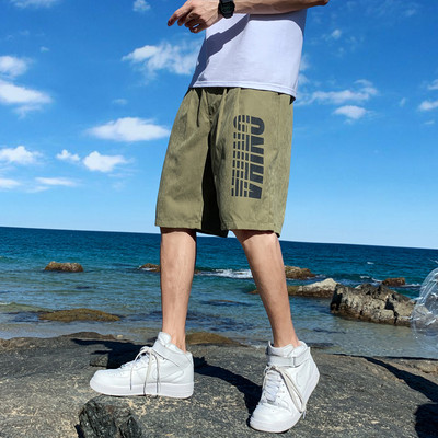 Férfi rövid strandnadrág felirattal