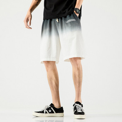 Mūsdienīgi vīriešu šorti zaigojošā krāsā un elastīga jostasvieta