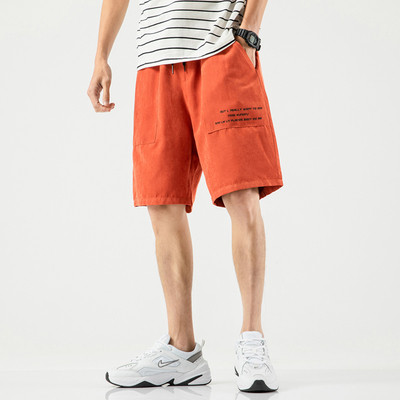 Taskute ja kirjaga meeste spordipüksid