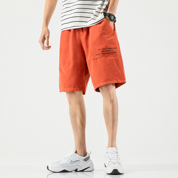 Taskute ja kirjaga meeste spordipüksid