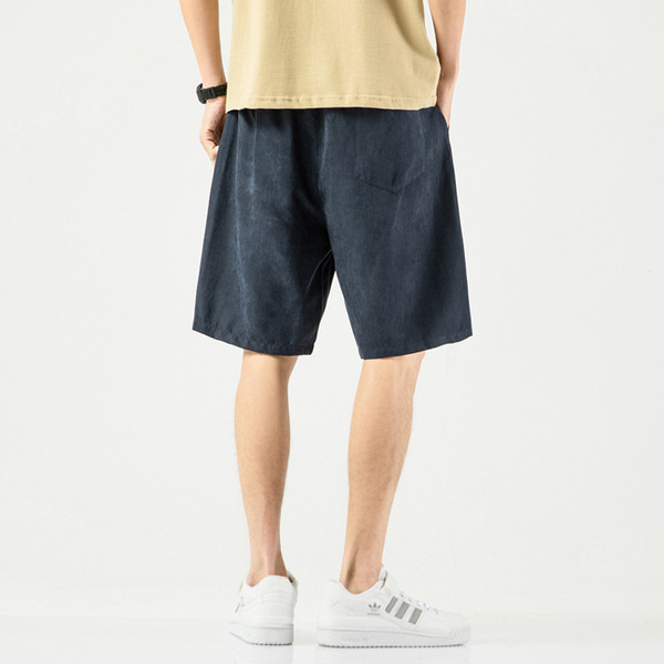 Taskute ja kirjaga meeste spordipüksid