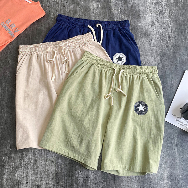 Taskute ja tikanditega sportlikud ja vabaaja meeste lühikesed püksid