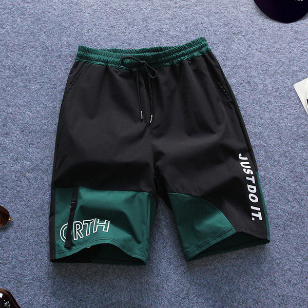 Moodsad kahevärvilised elastse vöökohaga meeste lühikesed püksid