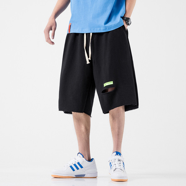 Meeste puuvillased lühikesed püksid, millel on väljalõike efekt ja suurus kuni 5XL