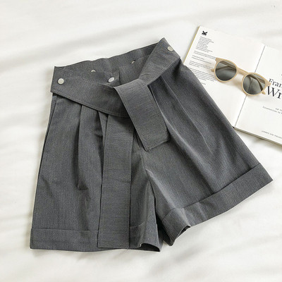 Μοντέρνο γυναικείο παντελόνι με ζώνη και κουμπιά