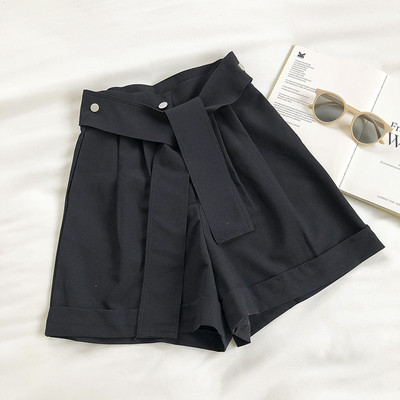 Μοντέρνο γυναικείο παντελόνι με ζώνη και κουμπιά