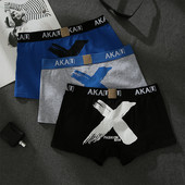 Kolmest meeste bokserist koosnev aplikatsiooni ja kirjadega komplekt