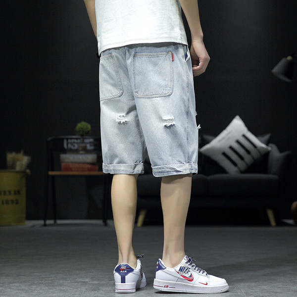 Férfi farmer rövidnadrág szakadt motívumokkal