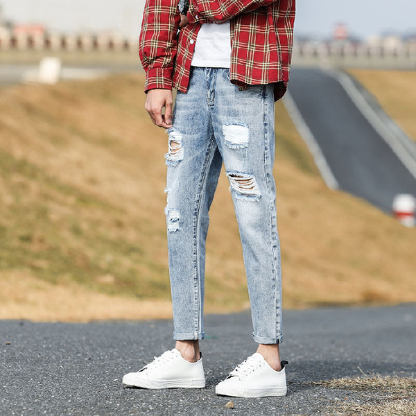 Blugi casual barbatesti cu motive rupte de culoare deschisa