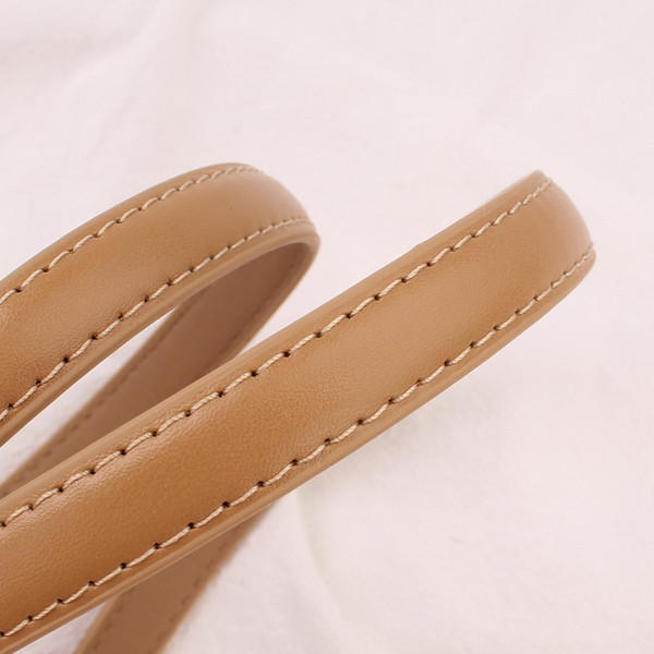 Cureaua de dama moderna din piele ecologica cu catarama metalica