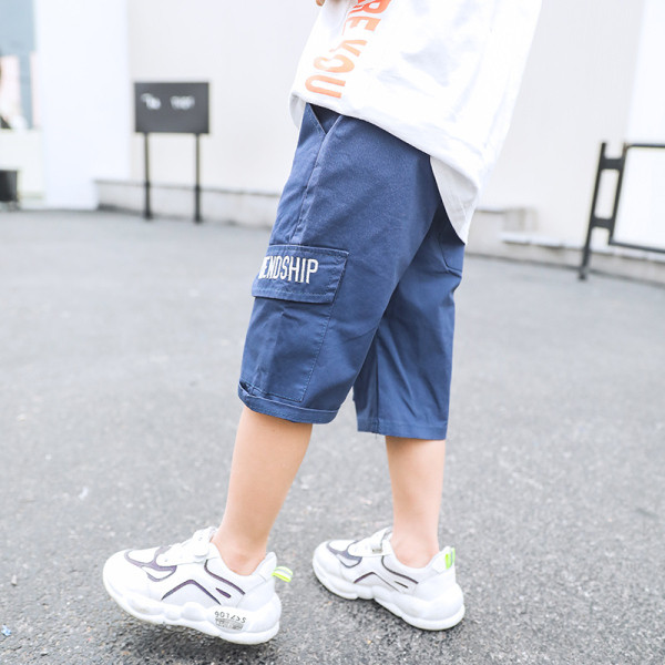 Pantaloni scurți pentru băieți cu buzunare și inscripție