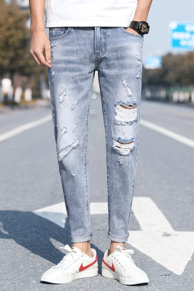 Μοντέρνα ανδρικά μακριά τζιν με σκισμένα μοτίβα