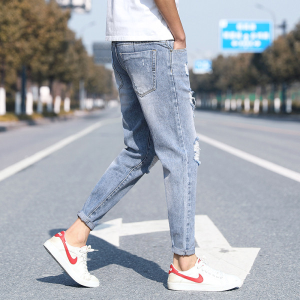 Μοντέρνα ανδρικά μακριά τζιν με σκισμένα μοτίβα