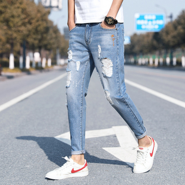 Μοντέρνα ανδρικά μακριά τζιν με σκισμένα μοτίβα