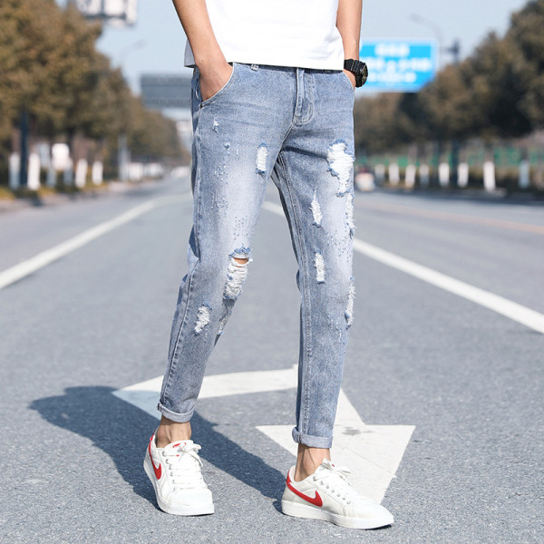 Μοντέρνα ανδρικά μακριά τζιν με σκισμένα μοτίβα